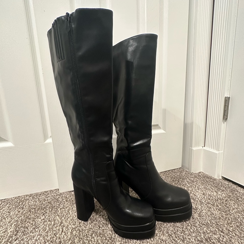 Knee high black boots, size 9.5. 4 inch heel